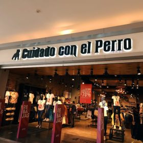 Letrero tienda Cuidado con el Perro